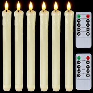 Flickering taper candles